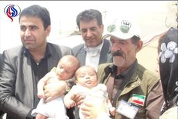 نجات دوقلوی 10ماهه از زیر آوار زلزله مشهد+عکس