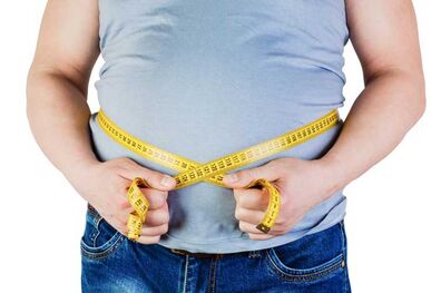 چگونه چربی شکم را آب کنیم؟